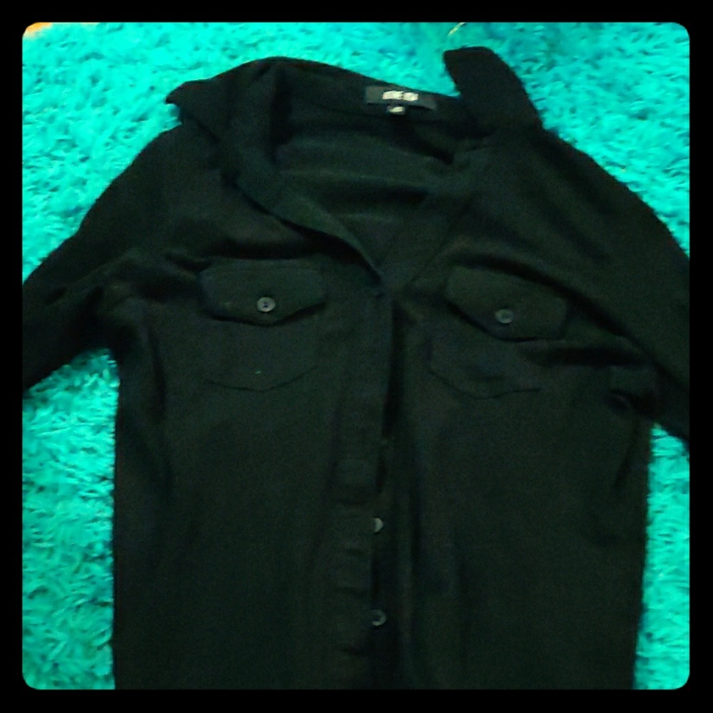 A black button up shirt w pockets